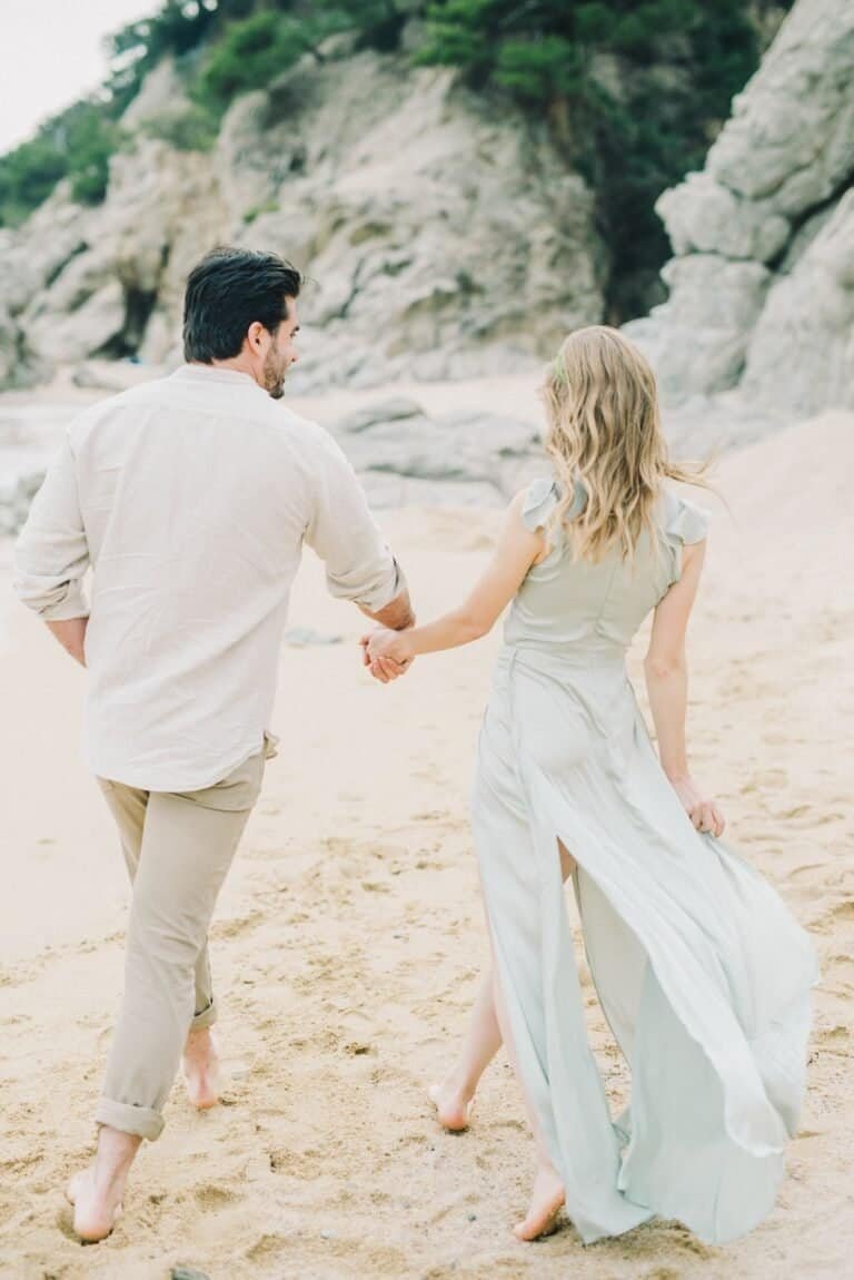 About us - couple on the sea shore